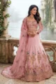 Designer Pink Lehenga in Luxury Ethnic Wear style with Intricate Zari Embroidery and Sequin Work, perfect for a Sangeet Outfit or Bridesmaid Fashion.