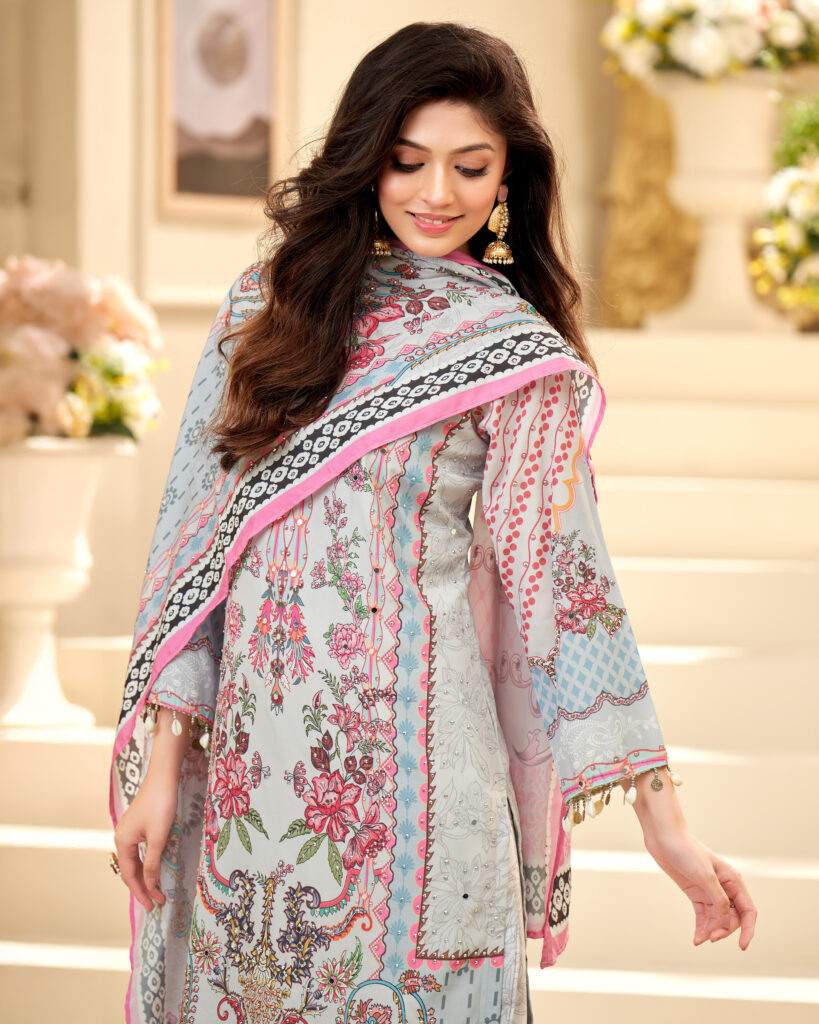 Close-up view of the detailed pink embroidery and micro mirror-work accents on the grey crepe neckline.