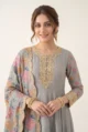 Close-up view of the dense handcrafted golden zari embroidery and intricate yoke work on the grey mal chanderi Anarkali.
